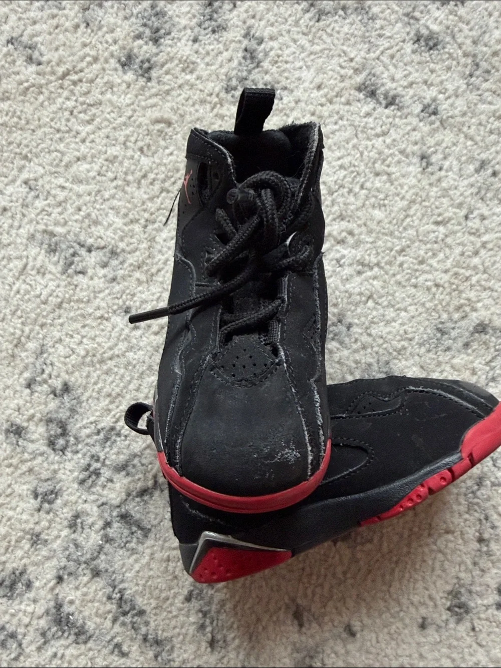 Jordan Kids size 7C shoes. Shows signs of wear.